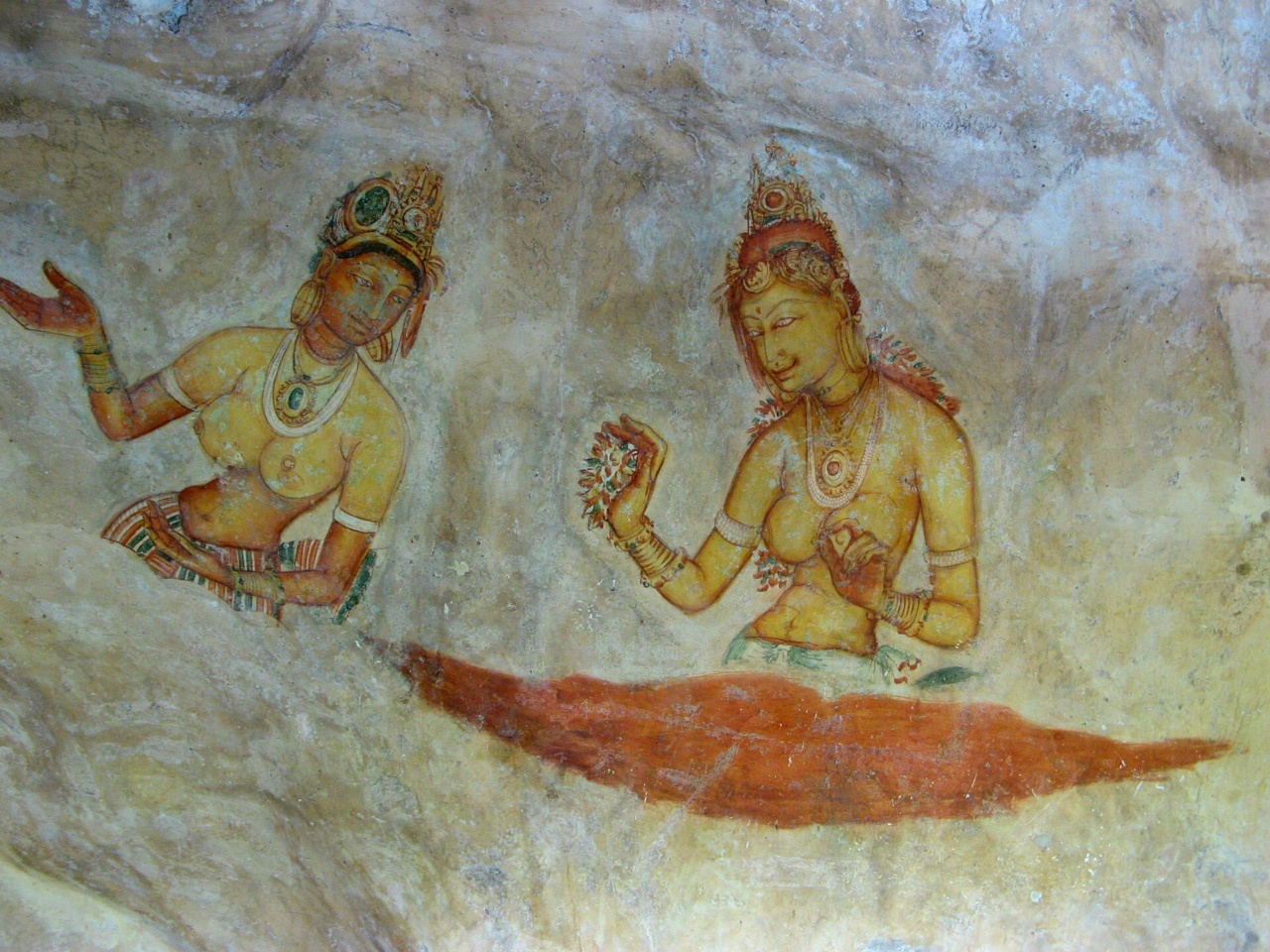 A fresco painting on the rock face at Sigiriya