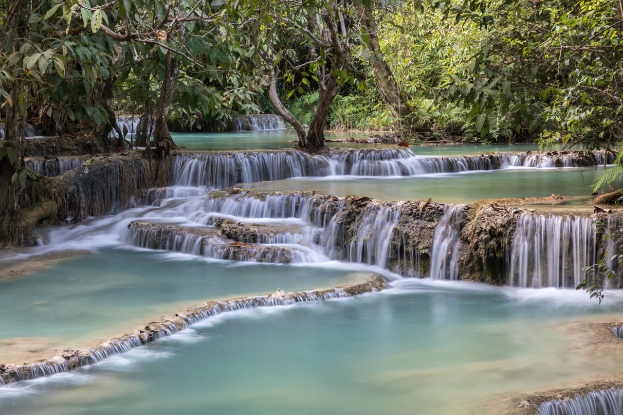 Turquoise pools and tiered cascades at Kuang Si Falls
