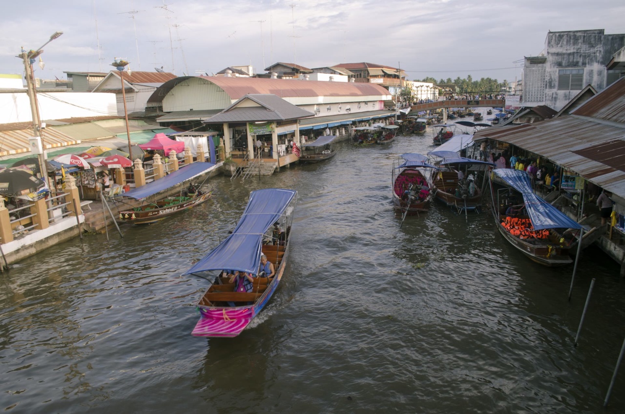 Boats on the canal at Amphawa Floating Market