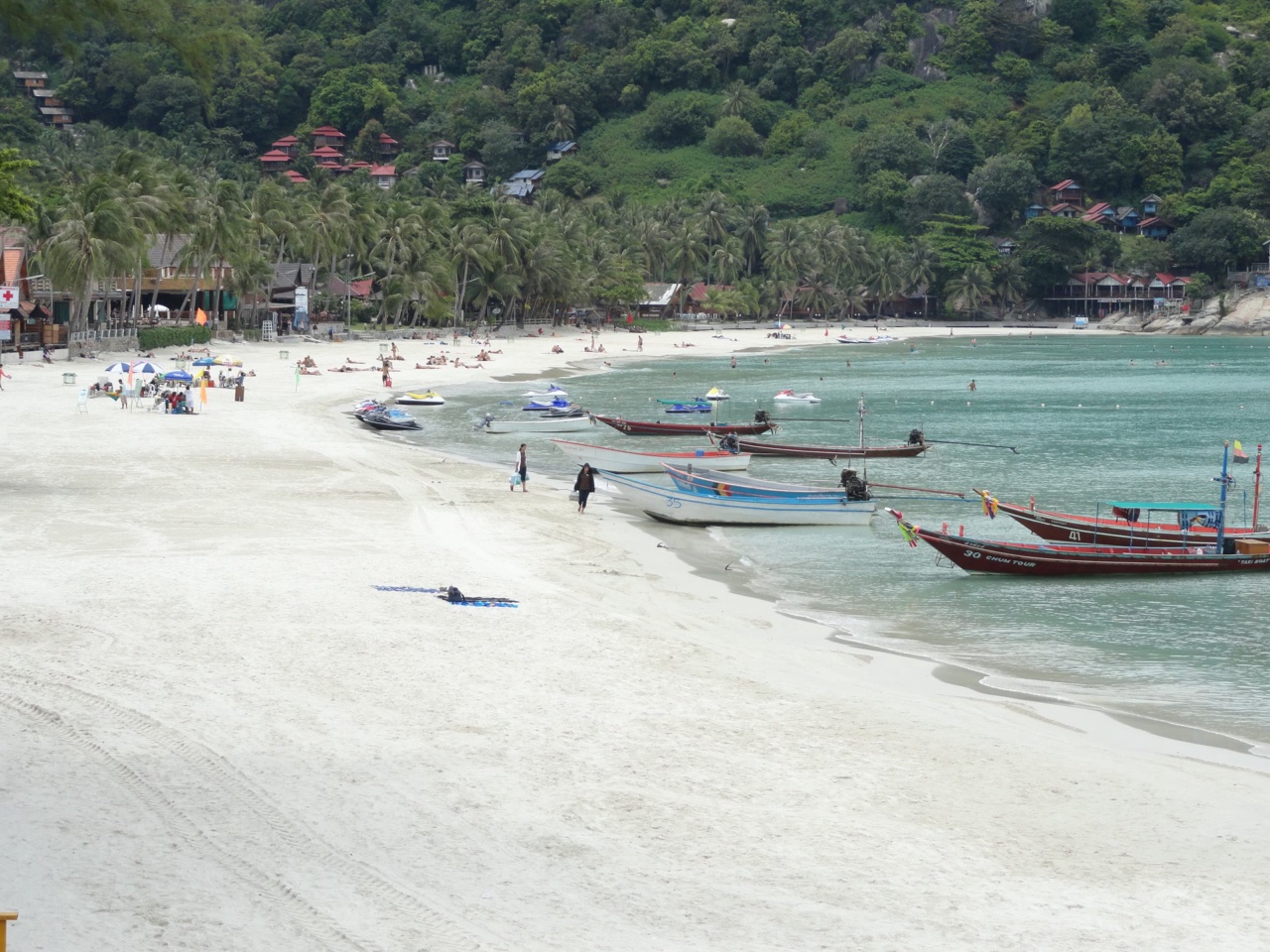 Longtail boats on the beach at Haad Rin