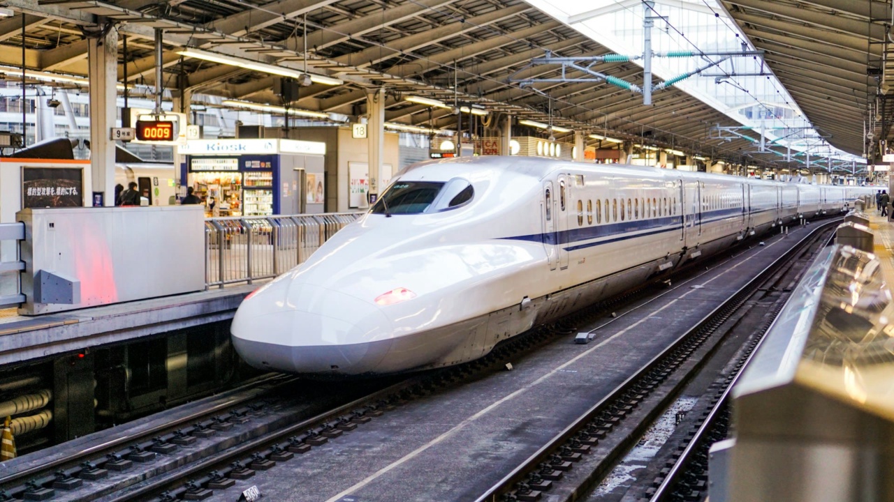 A Shinkansen bullet train at a station platform