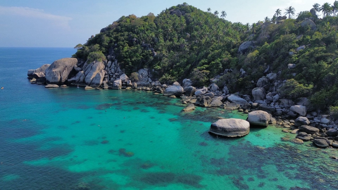 A bay on Koh Tao seen from above, with turquoise water