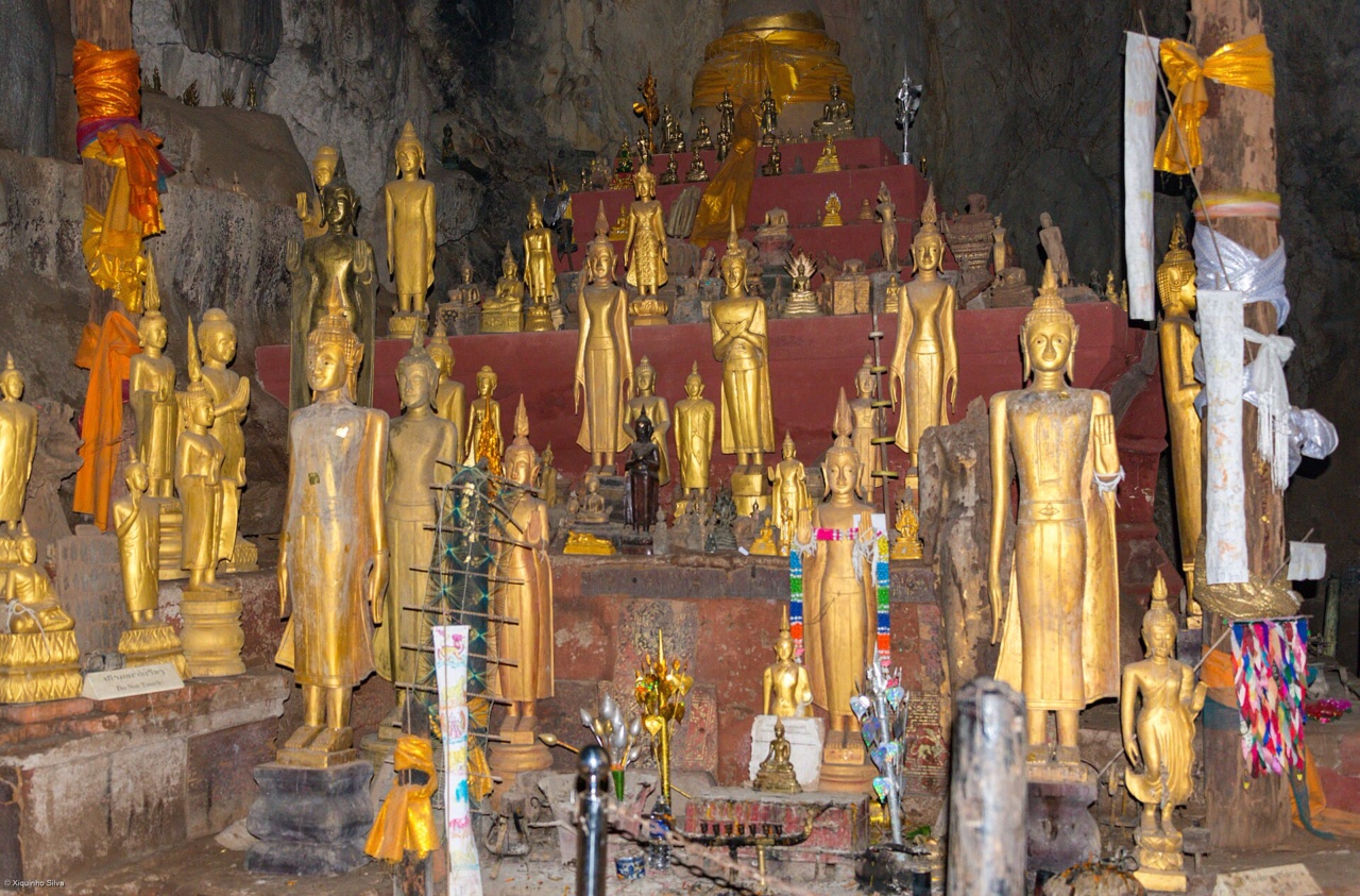 Gilded Buddha statues in the Pak Ou Caves