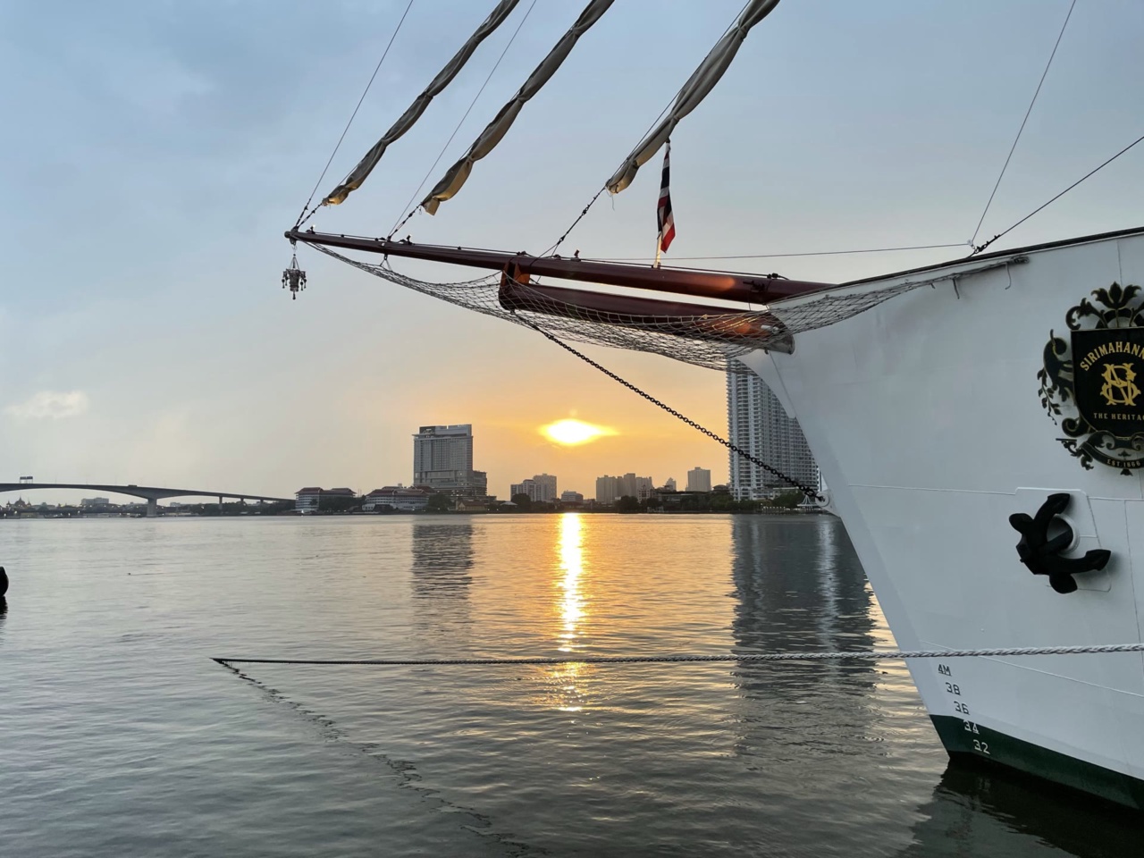 The Sirimahannop, a replica sailing ship moored at Asiatique, at sunset