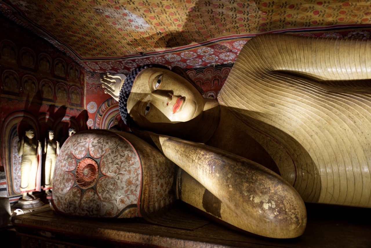 The reclining Buddha statue inside one of the Dambulla caves